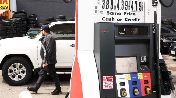 US energy chief says gas prices could stay above $3 per gallon until next year