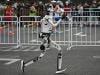Humans far behind as robot breaks record at Beijing half marathon