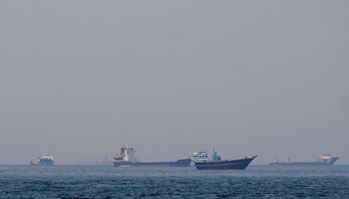 Ships and boats in the Strait of Hormuz off the coast of Musandam, Oman, April 20, 2026. — Reuters