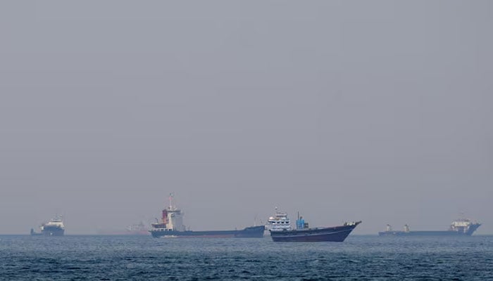 Ships and boats in the Strait of Hormuz off the coast of Musandam, Oman, April 20, 2026. — Reuters