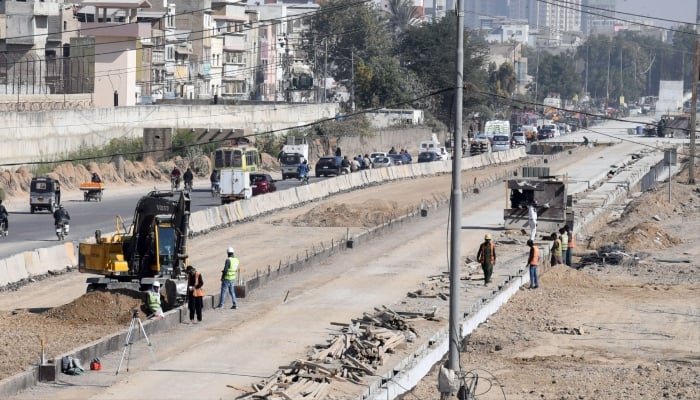 Labourers are busy in work during the construction of a new development projects Red Line at Jail Road in Karachi, February 10, 2026. — Online