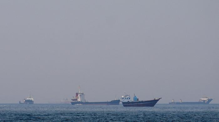 Oil prices dip, most stocks rise on lingering Iran peace hopes