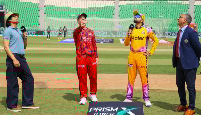 Peshawar Zalmi captain Babar Azam and Karachi Kings captain David Warner at the toss during a PSL 11 match at Gaddafi Stadium, Lahore, on April 22, 2026. — PCB