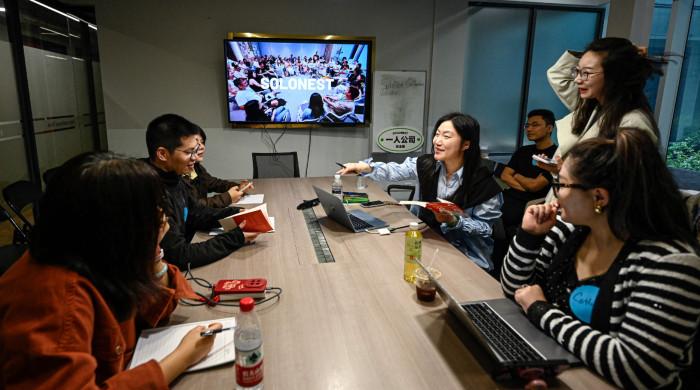 Young Chinese use AI to launch one-person firms over job anxiety
