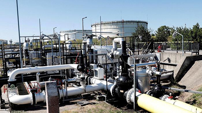 Oil, stocks fall as traders weigh outlook after Trump extends truce