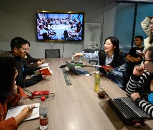 Young Chinese use AI to launch one-person firms over job anxiety