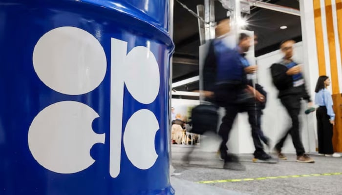 People walk past an installation depicting a barrel of oil with the logo of the Organisation of the Petroleum Exporting Countries (OPEC) in Baku, Azerbaijan, November 19, 2024. — Reuters