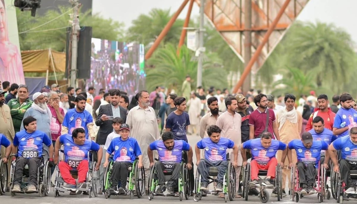 Photograph of a participant wearing a shirt featuring Maryam Nawaz Sharif, shared by Rabia Fiaz, a participant in the National Marathon and Cycling Race.