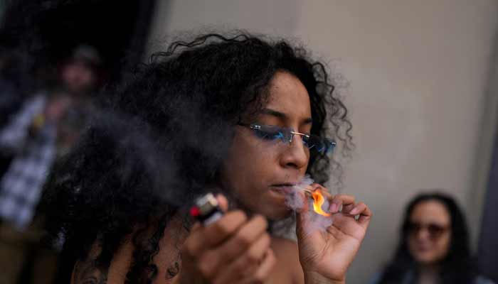 An enthusiast marks the informal annual cannabis holiday, 4/20 (four-twenty), corresponding to the numerical figure widely recognised within the cannabis subculture as a symbol for all things related to marijuana, at Dazed Cannabis dispensary in New York City, US. — Reuters/File