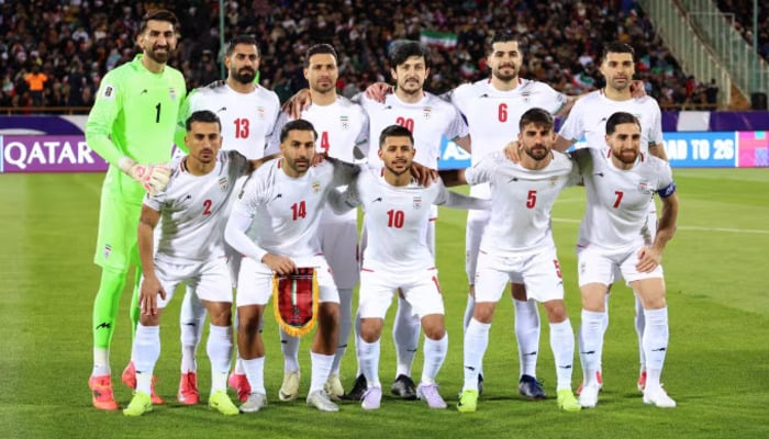 Irans national team poses for a photo before its World Cup qualifier against Uzbekistan in March 2025. — AFP
