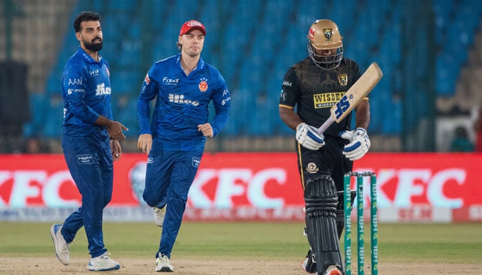 Hyderabad Kingsmen’s batter is walking towards the pavilion after being bowled out by Islamabad United at the National Bank Stadium on April 24. — PSL