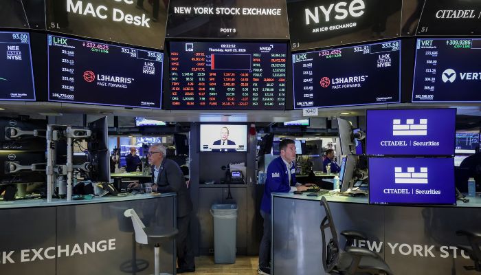 Traders work on the floor at the New York Stock Exchange (NYSE) in New York City, U.S., April 23, 2026. — Reuters