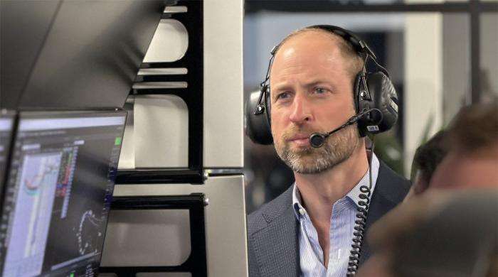 Prince William climbs into Jaguar I-TYPE 7
