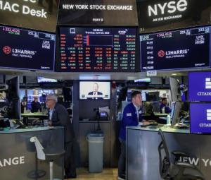 Tech boosts US stocks to record close, oil dips on signs of Iran peace progress