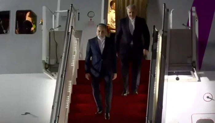 Iranian Foreign Minister Abbas Araghchi (left) descends aircraft stairs during visit to Pakistan, April 24, 2026. — Screengrab via X/@MIshaqDar50