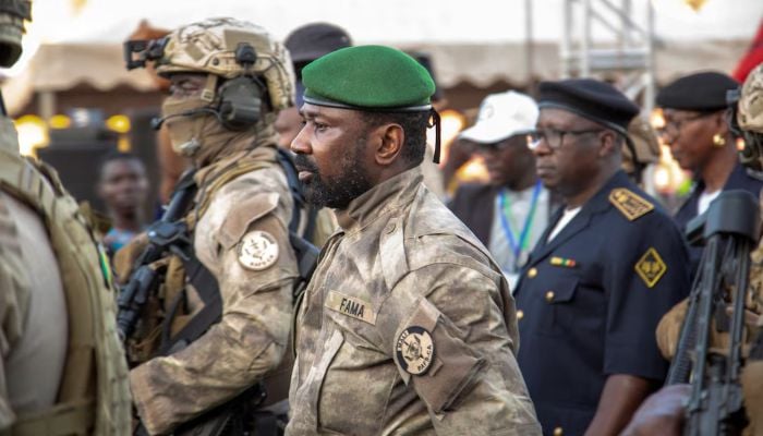 Malis junta leader Assimi Goita arrives to attend the last campaign rally of the Yes group for the referendum on constitutional amendments, in Bamako, Mali, June 16, 2023. — Reuters