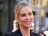Charlize Theron climbs Times Square billboard to launch Netflix ‘Apex'