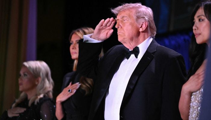 White House Press Secretary Karoline Leavitt, US First Lady Melania Trump, US President Donald Trump and CBS News senior White House correspondent Weijia Jiang attend the White House Correspondents´ dinner at the Washington Hilton in Washington, DC, on April 25, 2026. — AFP