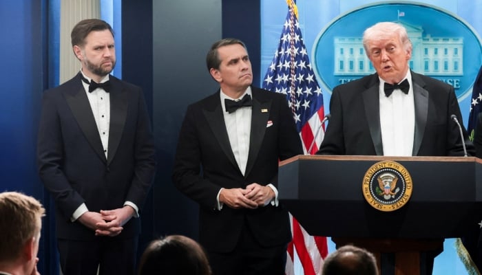 US President Donald Trump speaks next to acting Attorney General Todd Blanche and Vice President JD Vance at a press briefing at the White House, following a shooting incident during the annual White House Correspondents’ Association dinner, in Washington, DC, US, April 25, 2026. — Reuters
