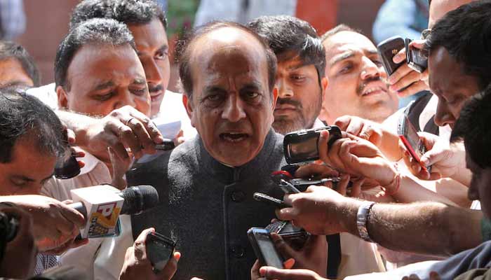 Indian politician Dinesh Trivedi speaks with the media outside the parliament in New Delhi March 15, 2012.— Reuters/File