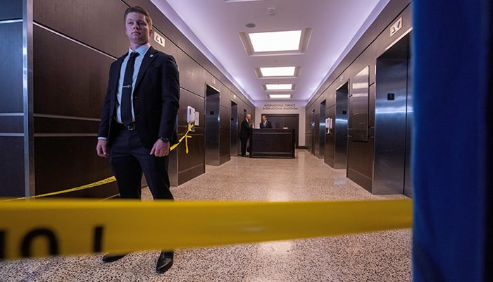 A secret service agent guards an area in the venue after a shooter opened fire during the annual White House Correspondents Association dinner in Washington, DC, US, April 25, 2026. — Reuters