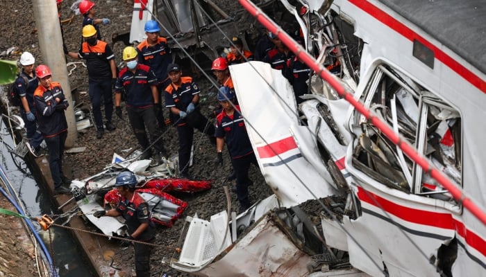 Technicians work at site after a deadly collision between a commuter line train and a long-distance train, in Bekasi, on the outskirts of Jakarta, Indonesia, April 28, 2026. — Reuters