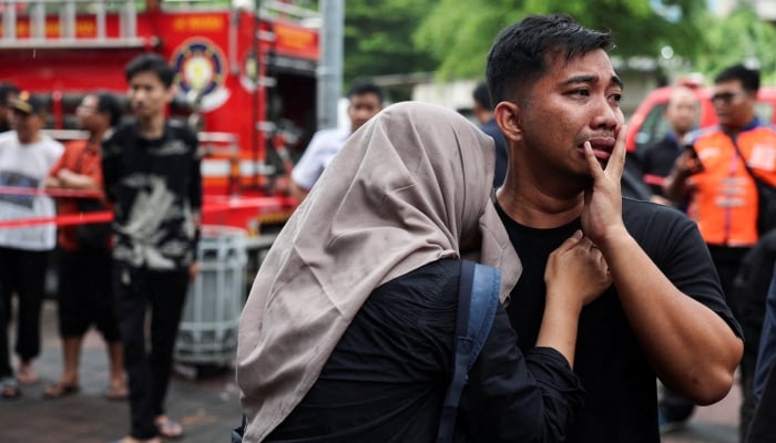 A man reacts as he looks for his sister following a deadly collision between a commuter line train and a long-distance train, in Bekasi, on the outskirts of Jakarta, Indonesia, April 28, 2026. — Reuters