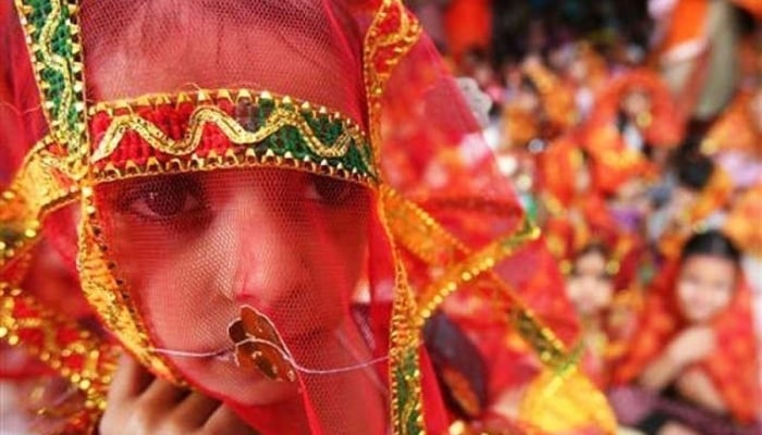 A child bride seen at a mass wedding ceremony. — Reuters/File