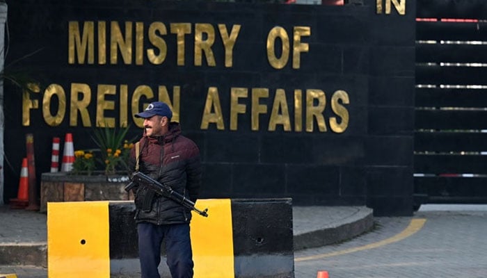 A Pakistani police officer stands guard outside the Ministry of Foreign Affairs in Islamabad on January 18, 2024. — AFP