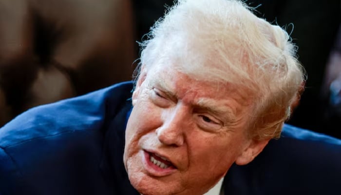 US President Donald Trump speaks in the Oval Office as he signs an executive order, at the White House in Washington, DC, US, December 18, 2025. — Reuters