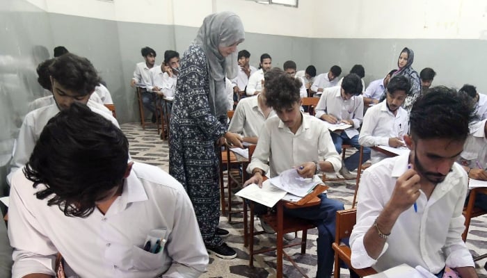 Students solve examination papers during annual examination at an examination centre in Karachi, April 29, 2026. — Online