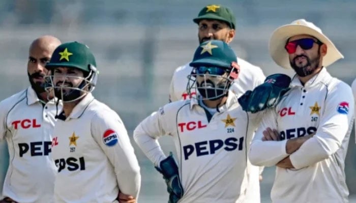Pakistan players wait for the DRS to do its thing during the second Test against the West Indies at the Multan Cricket Stadium in Multan on January 26, 2025. – AFP