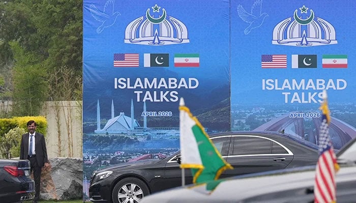 A Pakistani official stands during the arrival of the US Vice President JD Vance for talks with Iranian officials in Islamabad, Pakistan, Saturday, April 11, 2026. — Reuters