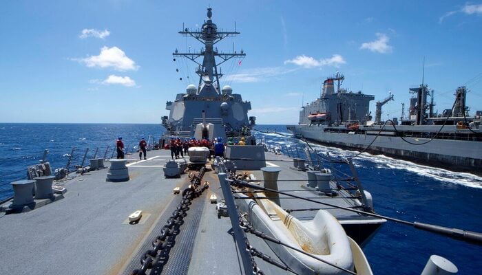 The US Navy Arleigh Burke-class guided-missile destroyer USS Kidd receives fuel from the Military Sealift Command replenishment oiler USNS Guadalupe in the Pacific Ocean March 27, 2020. — Reuters