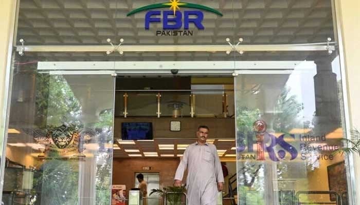 A man walks out of the Federal Board of Revenue (FBR) office in Islamabad on July 4, 2024. — AFP