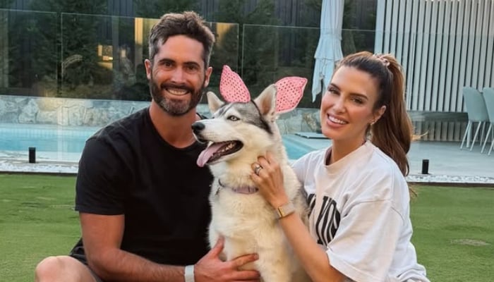 Australian model and TV presenter Erin Holland and her husband, Australian cricketer Ben Cuutting. — Instagram/@erinvholland