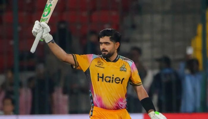 Peshawar Zalmis Babar Azam celebrates scoring his century during their PSL 11 Qualifier against Islamabad United at the National Bank Stadium in Karachi on April 28, 2026. — PSL