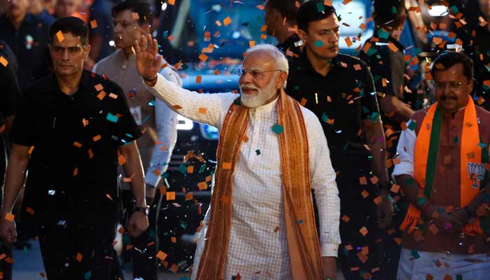 Indias Prime Minister Narendra Modi greets his supporters as he arrives at the Bharatiya Janata Party (BJP) headquarters as BJP celebrates its win in the West Bengal and Assam states assembly elections, in New Delhi, India, May 4, 2026.— Reuters