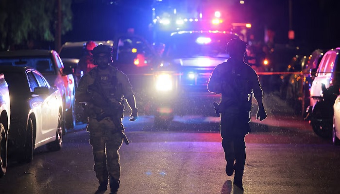 FBI agents walk outside the residence associated with Cole Tomas Allen, the suspect in the shooting incident at the annual White House Correspondents Association dinner in Washington, DC, in Torrance, California, US, April 25, 2026.— Reuters