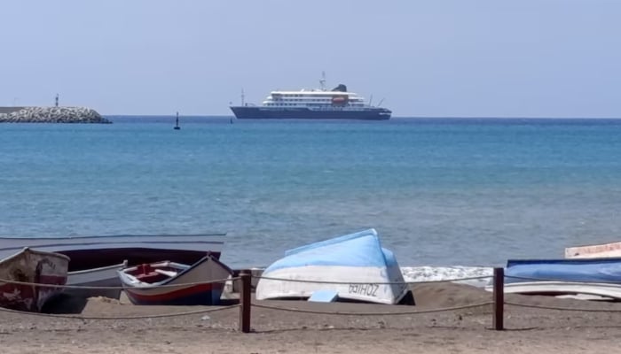 Cruise ship MV Hondius docks off Cape Verde port, as passengers were not allowed off the ship, while health authorities investigated suspected cases of hantavirus aboard the vessel, in Praia Port, Cape Verde, May 4, 2026. — Reuters