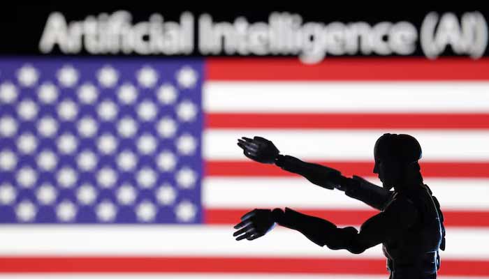 AI Artificial intelligence words, miniature of robot and US flag are seen in this illustration. — Reuter/File