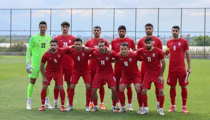 Iran’s national football team pose on the pitch before a friendly match with Costa Rica, in Antalya, southern Turkiye, on March 31, 2026. — AFP