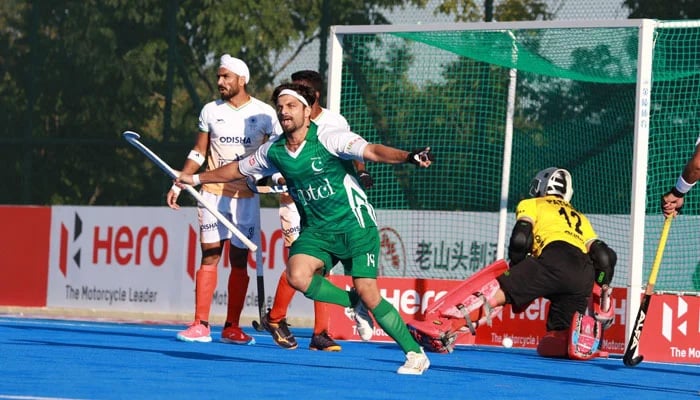 Pakistans Ahmad Nadeem celebrates scoring their first goal during their Asian Hockey Champions Trophy match against India at the Moqi Hockey Training Base in Hulunbuir City on September 14, 2024. — Asian Hockey Federation