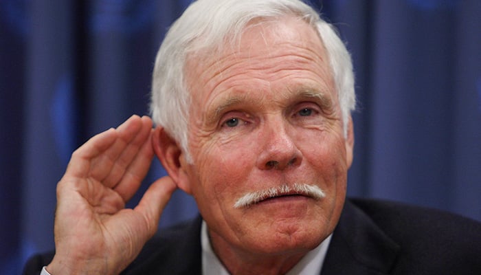 Ted Turner, Chairman of Turner Enterprises and the UN Foundation, listens to a question during a news conference on April 1, 2008 at the United Nations in New York. — AFP
