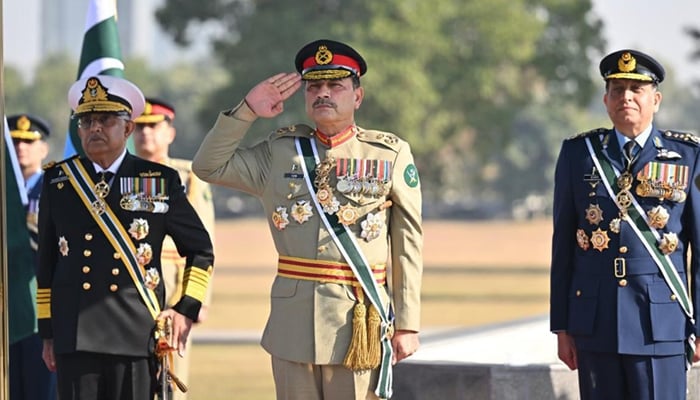 Field Marshal Syed Asim Munir (centre), Admiral Naveed Ashraf, Chief of the Naval Staff (left) and Air Chief Marshal Zaheer Ahmed Babar Sidhu, Chief of Air Staff at the General Headquarters in Rawalpindi on December 8, 2025. — ISPR
