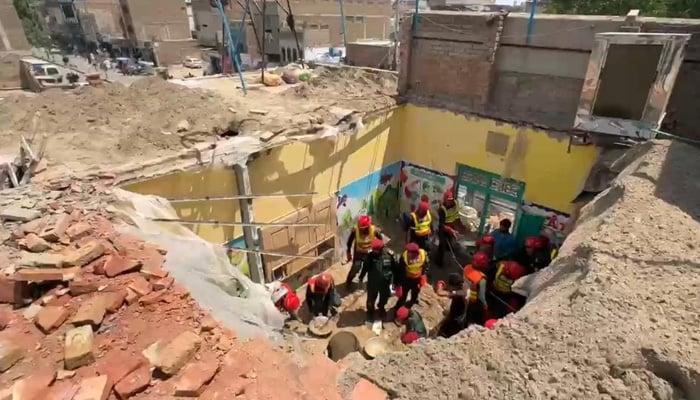 Emergency teams respond to a school roof collapse incident in Dera Ghazi Khan during rescue operations on May 7, 2026. — Reporter