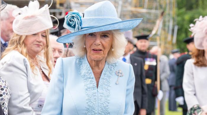 Queen Camilla clicks selfie with excited fan at Buckingham Palace party