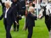 Queen Camilla mingles with riders and ex-husband in trousers