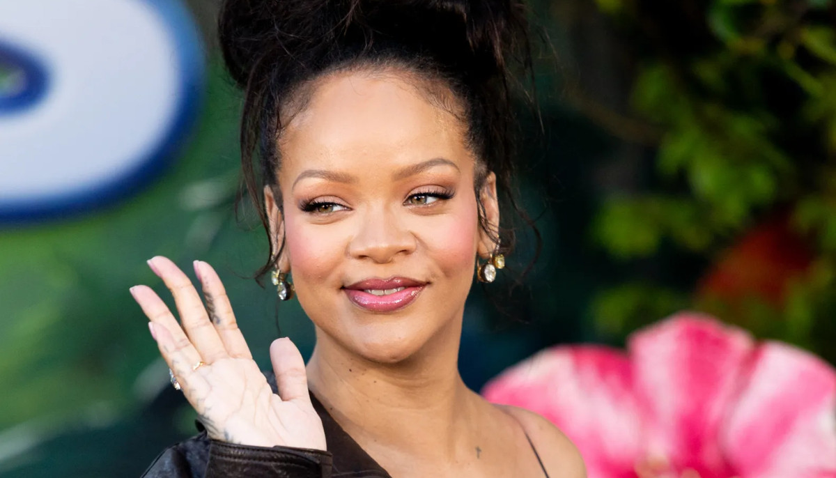 Rihanna embraces new tattoo given by children