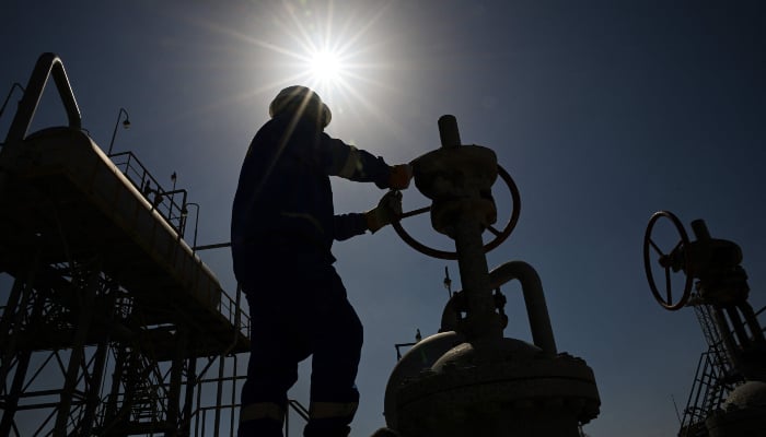 An employee of Basra Oil Company, works at the Nahr Bin Umar Oil and Gas Field on the outskirts of the southern Iraqi city of Basra on April 29, 2026. — AFP